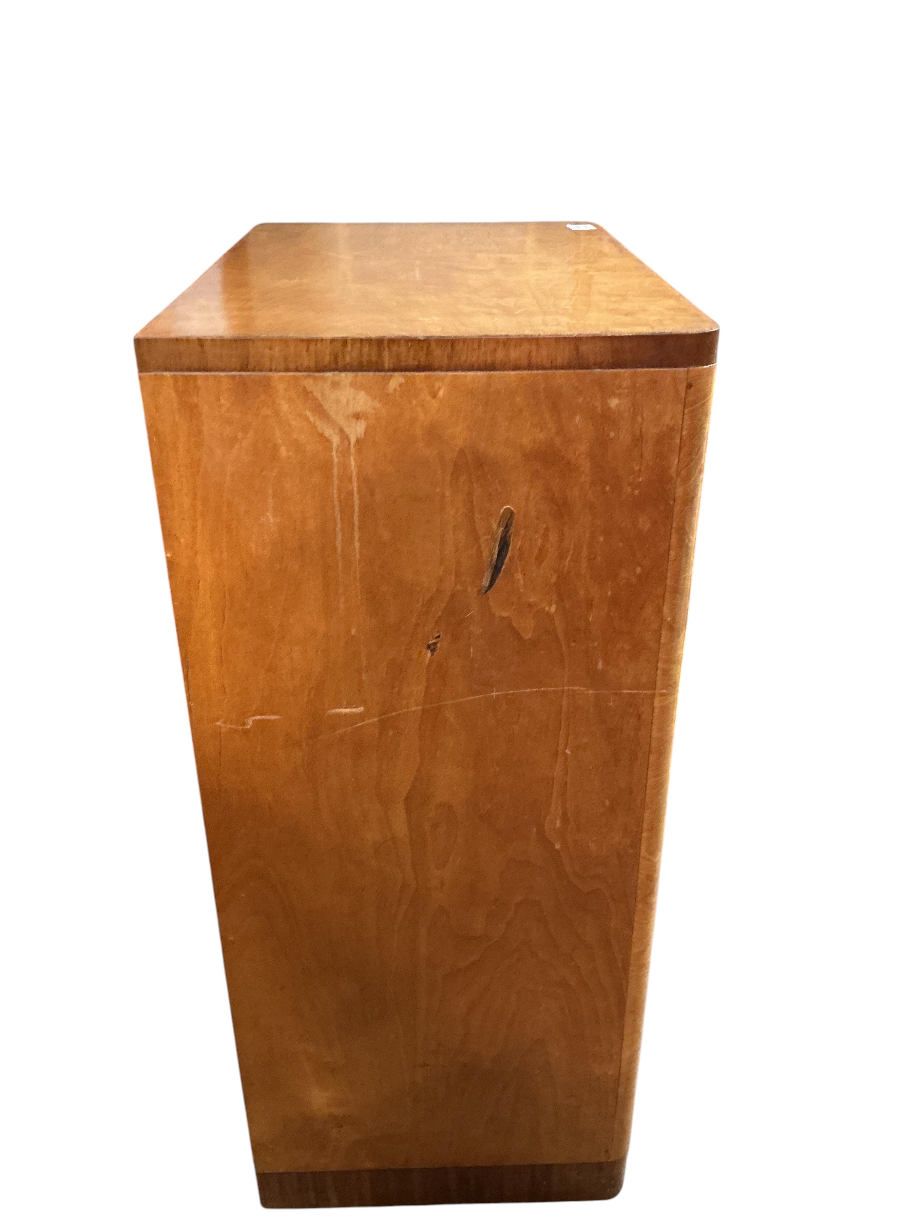 An early 20th century maple two drawer press cupboard, width 68cm, depth 45cm, height 107cm